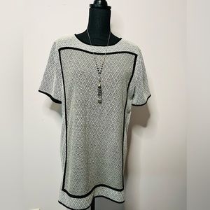 Crisp black and white dress with velvet trim detailing